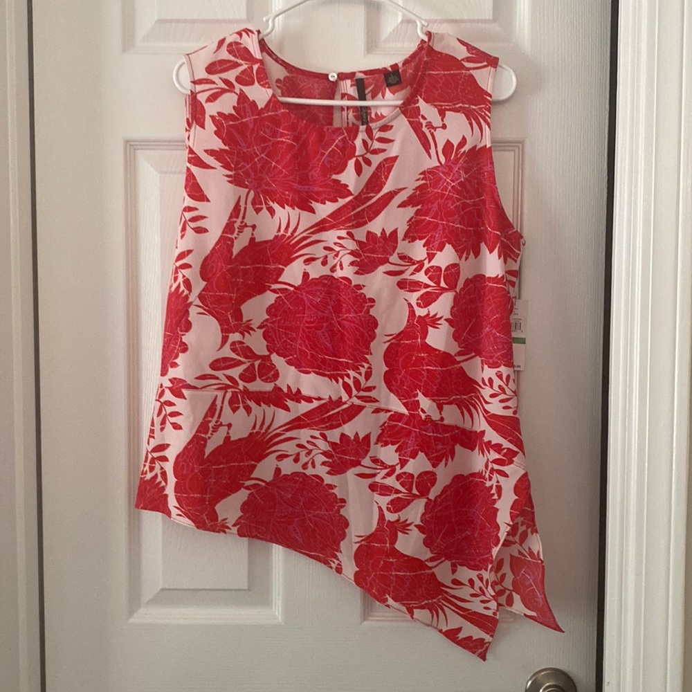 Skye’s the limit red/pink/white sleeveless asymmetrical blouse. Sz L. NWT.